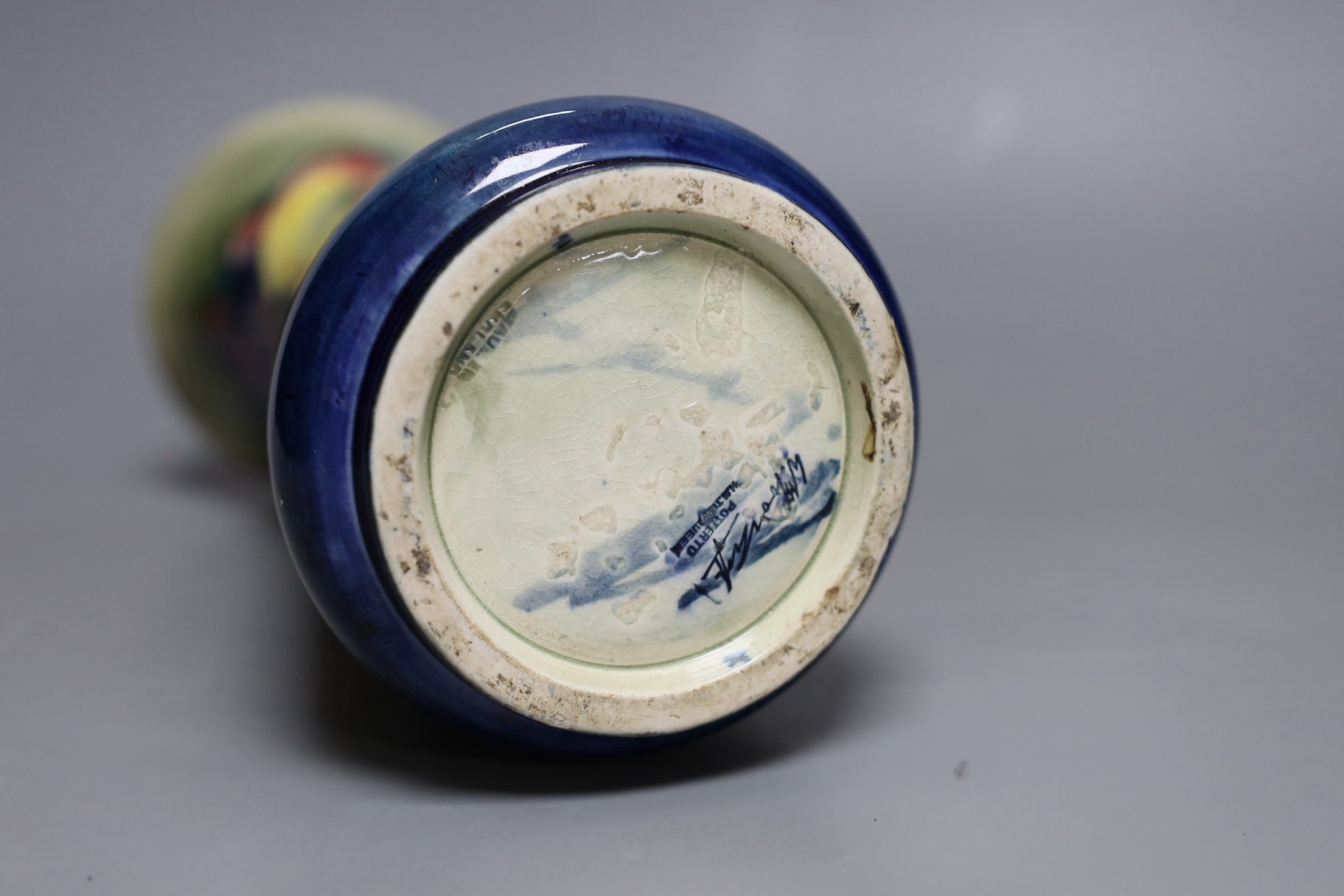 A Moorcroft leaf and berry vase, 26cm